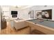 Entertaining basement with pool table, TV, and cozy seating, perfect for recreation and relaxation at 580 Hutchens Se Rd, Atlanta, GA 30354