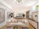 Spacious basement rec room with modern furnishings, pool table, and stylish decor for entertainment and relaxation at 580 Hutchens Se Rd, Atlanta, GA 30354