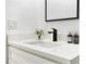 Elegant bathroom featuring a white countertop with modern fixtures and decor, creating a clean and stylish space at 580 Hutchens Se Rd, Atlanta, GA 30354