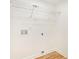 Simple, functional laundry room with wire shelving for storage and visible hookups at 580 Hutchens Se Rd, Atlanta, GA 30354