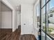 Inviting foyer with modern flooring, white walls, and ample natural light streaming through a stylish window at 2200 Carlton Ct # 6, Atlanta, GA 30318