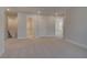 Spacious bonus room with neutral carpet, natural light and access to other rooms at 4045 Andover Cir, Mcdonough, GA 30252