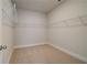 Walk-in closet with ample shelving and storage space, providing organization and functionality for wardrobe management at 4045 Andover Cir, Mcdonough, GA 30252