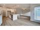 Spacious kitchen with an island, stainless steel appliances, hardwood floors, and open layout at 4045 Andover Cir, Mcdonough, GA 30252