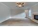 Bright living room with hardwood flooring and a fireplace offering a cozy space for relaxing and entertaining at 4045 Andover Cir, Mcdonough, GA 30252