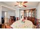 View of the dining room featuring hardwood floors and traditional furnishings at 410 Killian Hill Sw Rd, Lilburn, GA 30047