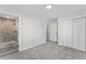Large bedroom with carpet, a walk-in shower, and closet space at 6107 Waterton Dr, Lithonia, GA 30058