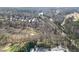 Picturesque aerial shot of homes nestled beside a lush golf course at 10 Club Ct, Alpharetta, GA 30005