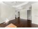 Bedroom featuring dark hardwood floors, recessed lighting and adjacent access to the bathroom at 10 Club Ct, Alpharetta, GA 30005