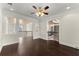 Spacious bonus room boasts dark wood floors and open access to other areas on the second level at 10 Club Ct, Alpharetta, GA 30005