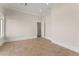 Bright, empty room with tile flooring, crown moulding, and fresh white paint at 10 Club Ct, Alpharetta, GA 30005