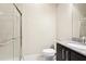 Bathroom featuring a tiled shower and a modern vanity with granite countertop at 1199 Huff Rd # 121, Atlanta, GA 30318