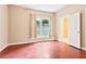 Bedroom featuring neutral walls, hardwood floors and an attached bathroom at 1199 Huff Rd # 121, Atlanta, GA 30318