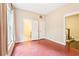 Bedroom featuring hardwood floors, neutral walls, and adjacent bathroom and closet at 1199 Huff Rd # 121, Atlanta, GA 30318