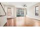 Inviting living room with large windows providing natural light and a view of the neighborhood at 1199 Huff Rd # 121, Atlanta, GA 30318