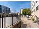 Relaxing patio area with tables, chairs, and lush landscaping in a desirable community setting at 2479 Peachtree Ne Rd # 912, Atlanta, GA 30305