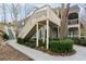 Exterior staircase leads to a screened porch and balcony of condo at 500 Bainbridge Dr, Atlanta, GA 30327