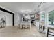 Open concept kitchen with large island, stainless steel appliances, and decorative lighting at 1887 Lake Ridge Ter, Lawrenceville, GA 30043