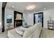 Inviting living room featuring a fireplace, stylish decor, and an open layout with ample natural light at 1887 Lake Ridge Ter, Lawrenceville, GA 30043