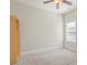 Bedroom with carpet flooring, a ceiling fan and a window at 127 Cranbrooke Dr, Dallas, GA 30157