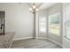 Eat-in kitchen area with bright windows and modern fixtures at 127 Cranbrooke Dr, Dallas, GA 30157