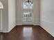 Dining room with modern chandelier and large window at 253 Yardsley Dr, Mcdonough, GA 30253