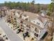 Charming townhome community featuring attached garages, balconies, and manicured landscaping at 3066 Quantum Ln # 24, Atlanta, GA 30341