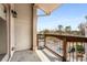 Balcony with wrought iron railing offers views of the surrounding street at 3066 Quantum Ln # 24, Atlanta, GA 30341