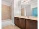 Bathroom featuring a shower-tub, vanity with storage, and large mirror perfect for a guest at 3066 Quantum Ln # 24, Atlanta, GA 30341