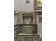 Close-up of a welcoming front door with stone and brick detailing, leading to a stylish residence at 3066 Quantum Ln # 24, Atlanta, GA 30341