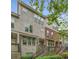 Charming townhome with a mix of stone and brick exterior and well-maintained landscaping at 3066 Quantum Ln # 24, Atlanta, GA 30341