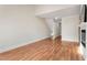 Cozy living room featuring hardwood floors and a fireplace, creating a comfortable ambiance at 3066 Quantum Ln # 24, Atlanta, GA 30341
