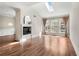 Bright living room with hardwood floors, fireplace, and a vaulted ceiling with skylight at 3066 Quantum Ln # 24, Atlanta, GA 30341