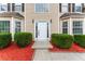 Charming home featuring a classic white front door and well-maintained landscaping at 3529 Riverview Approach, Ellenwood, GA 30294