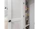 View of utility closet behind a white door at 3529 Riverview Approach, Ellenwood, GA 30294