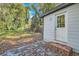 A view of the backyard and an exterior entry door at 1251 Richland Sw Rd, Atlanta, GA 30310