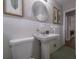 Charming bathroom featuring classic fixtures, white tile, and stylish decor at 1251 Richland Sw Rd, Atlanta, GA 30310