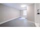 Bedroom featuring neutral paint, window, and views to the hall and closet at 1251 Richland Sw Rd, Atlanta, GA 30310