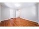 Bedroom featuring gleaming hardwood floors and neutral paint at 1251 Richland Sw Rd, Atlanta, GA 30310