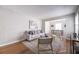 Inviting living room features hardwood floors, a modern rug, and ample natural light at 1251 Richland Sw Rd, Atlanta, GA 30310