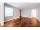 Bright living room with hardwood floors, neutral walls, and large windows to enjoy the outdoor light at 1251 Richland Sw Rd, Atlanta, GA 30310