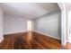 Spacious living room with gleaming hardwood floors and ample natural light at 1251 Richland Sw Rd, Atlanta, GA 30310