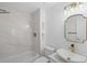 Bathroom with white marble-style tile, chrome fixtures, and vessel sink at 1711 Summit Glen Ln, Atlanta, GA 30329