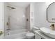 Bathroom with white marble-style tile, chrome fixtures, and vessel sink at 1711 Summit Glen Ln, Atlanta, GA 30329