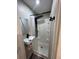 Compact bathroom with a modern shower system, a small sink, and sleek fixtures at 3042 Humphries Hill Rd, Austell, GA 30106