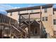 A raised wood deck overlooks the backyard of this home at 3282 Spicy Cedar Ln, Lithonia, GA 30038