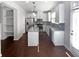 Well-equipped kitchen featuring white cabinets, stainless steel appliances, and granite countertops at 3282 Spicy Cedar Ln, Lithonia, GA 30038