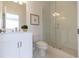 Modern bathroom featuring a glass-enclosed shower, white subway tile, and sleek fixtures at 504 Healy Dr # 75, Cumming, GA 30040