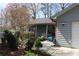 Charming one-story home featuring an attached garage and a well-maintained yard at 1302 Buttercup Ct, Lawrenceville, GA 30044