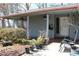 Inviting porch area with ceiling fans and shade, lined with potted plants at 1302 Buttercup Ct, Lawrenceville, GA 30044